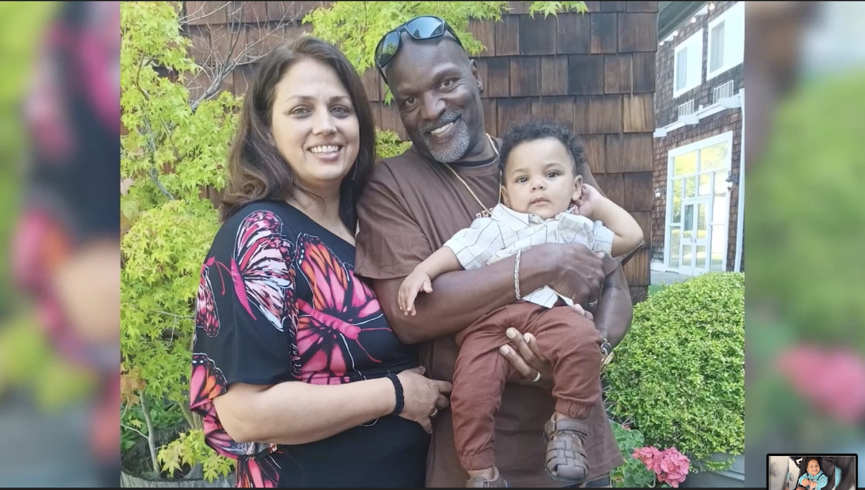 Ralpheal with his wife and baby son